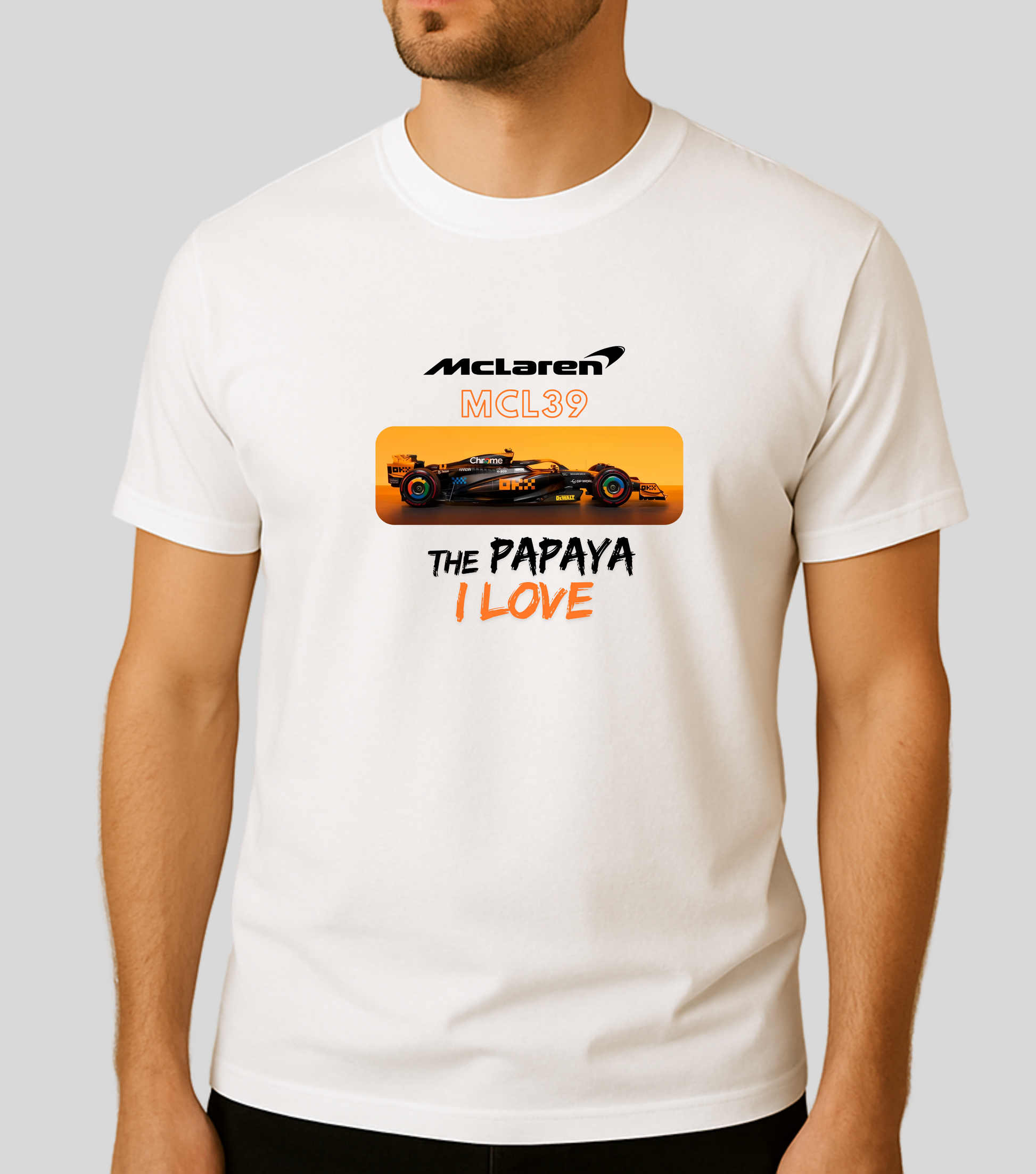 Person wearing a white t-shirt with McLaren logo and race car graphic.